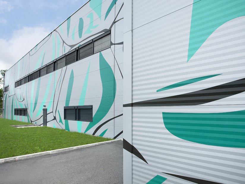 De architecten hadden voor de vormgeving een ongebruikelijk idee door middel van de microscopische opname van de daar geproduceerde worst.